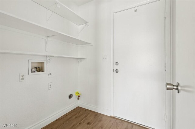 4552 Aviation St, Las Vegas, NV 89115 - laundry room featuring gas dryer hookup, wood finished floors, washer hookup, and baseboards