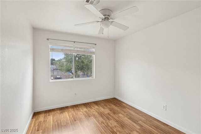 4552 Aviation St, Las Vegas, NV 89115 - empty room featuring light wood-type flooring, baseboards, and ceiling fan