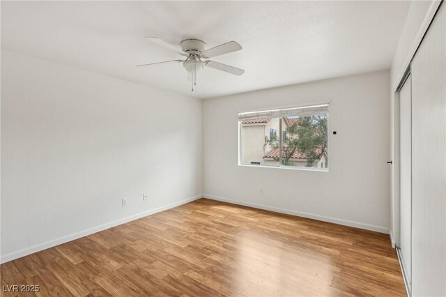 4552 Aviation St, Las Vegas, NV 89115 - unfurnished room featuring light wood-type flooring, baseboards, and ceiling fan