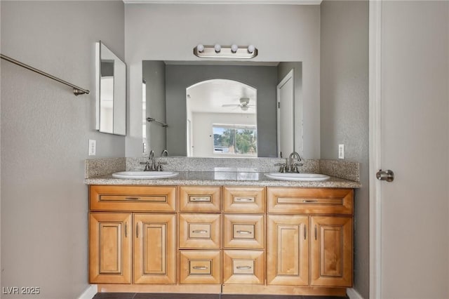 4552 Aviation St, Las Vegas, NV 89115 - bathroom featuring double vanity and ceiling fan