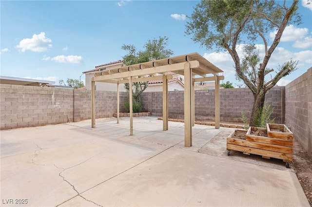4552 Aviation St, Las Vegas, NV 89115 - fenced backyard with a patio and a pergola