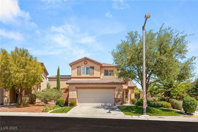 11226 Kenyan Sunshine Ct, Las Vegas, NV 89138 - view of front facade with concrete driveway, a garage, stucco siding, and stone siding