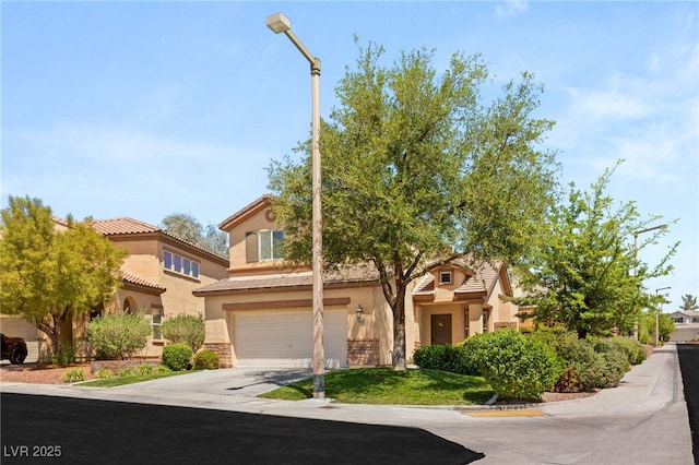 11226 Kenyan Sunshine Ct, Las Vegas, NV 89138 - mediterranean / spanish home with an attached garage, driveway, stucco siding, and stone siding