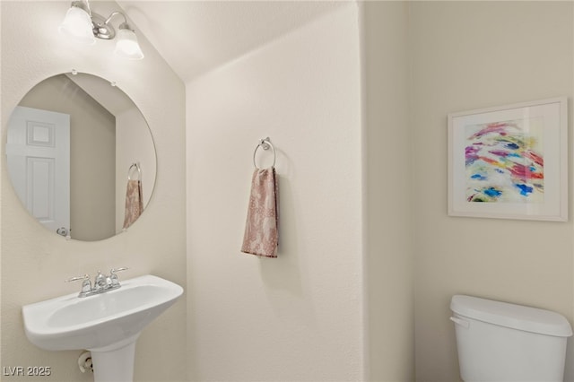 11226 Kenyan Sunshine Ct, Las Vegas, NV 89138 - bathroom featuring toilet and a sink