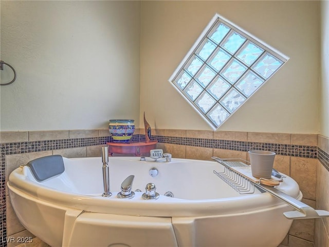 401 Obsidian St, Las Vegas, NV 89145 - bathroom with a tub with jets and tile walls