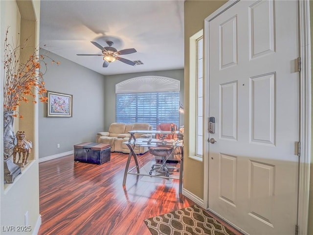 401 Obsidian St, Las Vegas, NV 89145 - entrance foyer with baseboards, a ceiling fan, and wood finished floors