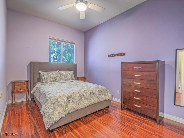 401 Obsidian St, Las Vegas, NV 89145 - bedroom with dark wood finished floors, baseboards, and a ceiling fan