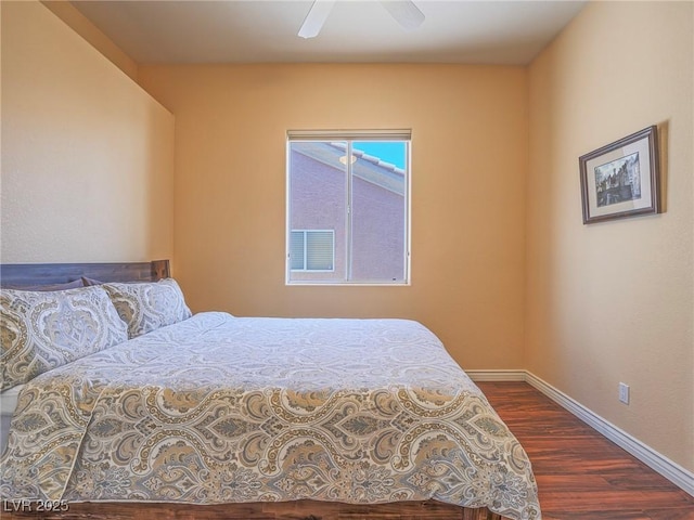 401 Obsidian St, Las Vegas, NV 89145 - bedroom featuring dark wood-type flooring, baseboards, and ceiling fan