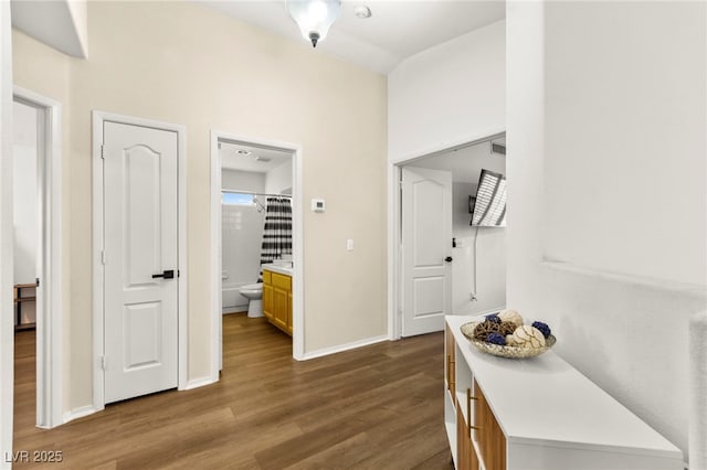 8612 Danza Del Sol Dr, Las Vegas, NV 89128 - hallway featuring wood finished floors and baseboards