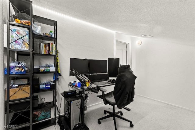 8612 Danza Del Sol Dr, Las Vegas, NV 89128 - home office featuring a textured ceiling, baseboards, and carpet flooring