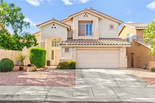 8612 Danza Del Sol Dr, Las Vegas, NV 89128 - mediterranean / spanish-style home featuring a tile roof, stucco siding, driveway, and an attached garage