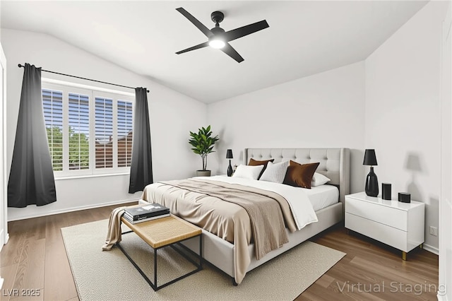 8612 Danza Del Sol Dr, Las Vegas, NV 89128 - bedroom with vaulted ceiling, dark wood finished floors, and ceiling fan