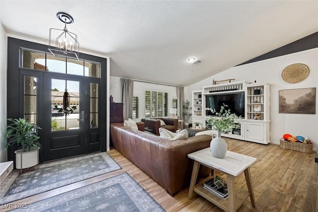 211 Kokopelli Ct, Henderson, NV 89074 - living room with wood finished floors, plenty of natural light, and lofted ceiling