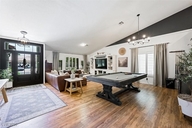 211 Kokopelli Ct, Henderson, NV 89074 - rec room with a chandelier, vaulted ceiling, wood finished floors, and billiards