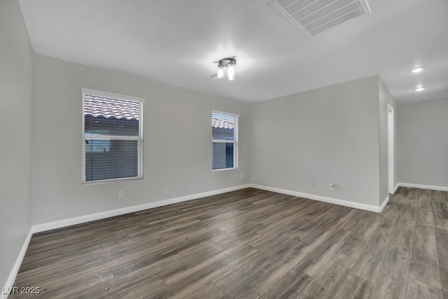 11787 Fern Creek Ln, Las Vegas, NV 89183 - empty room with dark wood-style flooring and baseboards