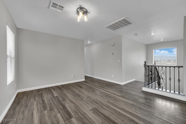 11787 Fern Creek Ln, Las Vegas, NV 89183 - spare room with dark wood finished floors and baseboards