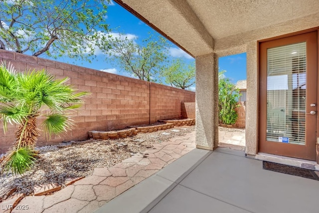 11787 Fern Creek Ln, Las Vegas, NV 89183 - fenced backyard featuring a patio
