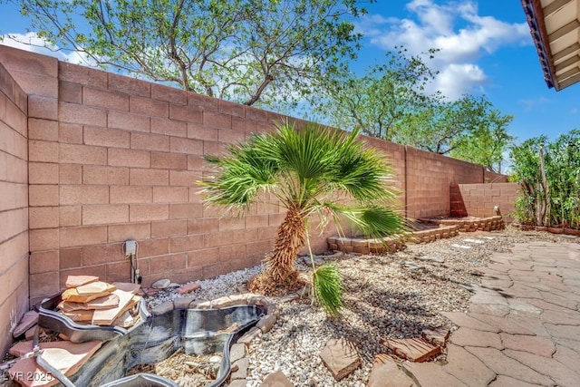 11787 Fern Creek Ln, Las Vegas, NV 89183 - fenced backyard featuring a patio area