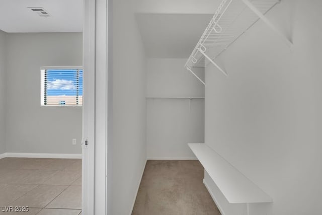 11787 Fern Creek Ln, Las Vegas, NV 89183 - walk in closet with light tile patterned floors
