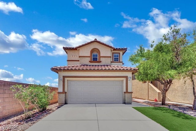 11787 Fern Creek Ln, Las Vegas, NV 89183 - mediterranean / spanish house with stucco siding, driveway, a tile roof, and an attached garage