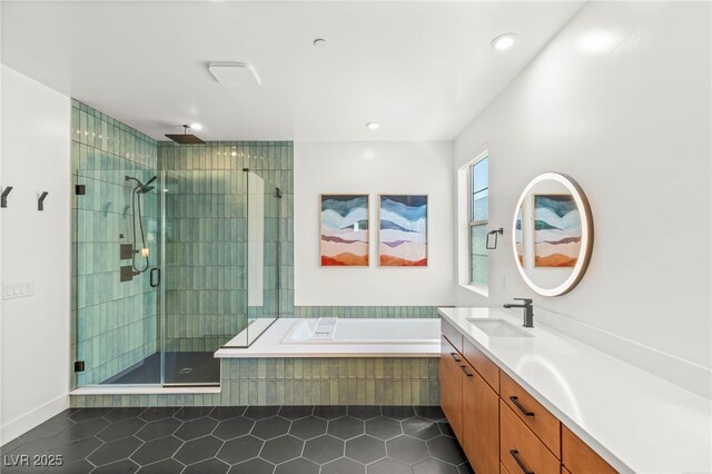 2578 Skylark Trail St, Henderson, NV 89044 - full bath featuring tile patterned flooring, a stall shower, vanity, a garden tub, and recessed lighting