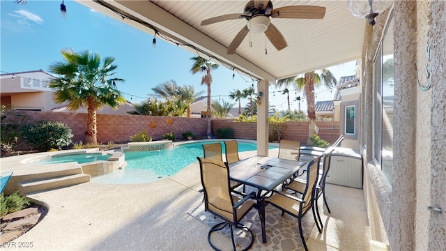 2713 Tanagrine Dr, North Las Vegas, NV 89084 - view of swimming pool with a fenced backyard, a ceiling fan, a patio, a pool with connected hot tub, and outdoor dining area