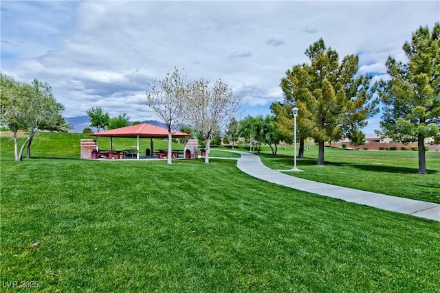 2713 Tanagrine Dr, North Las Vegas, NV 89084 - surrounding community featuring a gazebo and a lawn