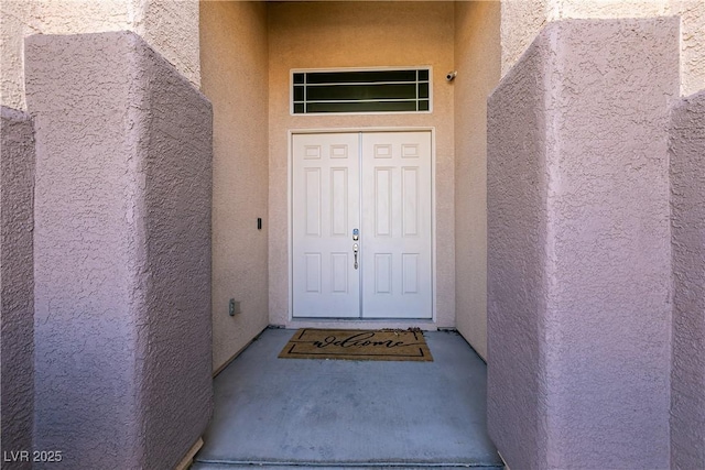 2713 Tanagrine Dr, North Las Vegas, NV 89084 - property entrance featuring stucco siding