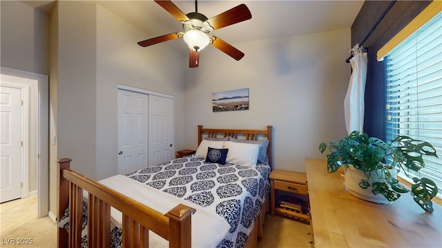 2713 Tanagrine Dr, North Las Vegas, NV 89084 - bedroom featuring light carpet, a closet, and ceiling fan