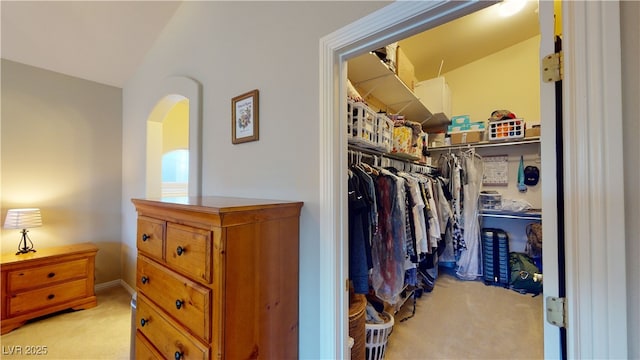 2713 Tanagrine Dr, North Las Vegas, NV 89084 - spacious closet featuring light colored carpet and arched walkways