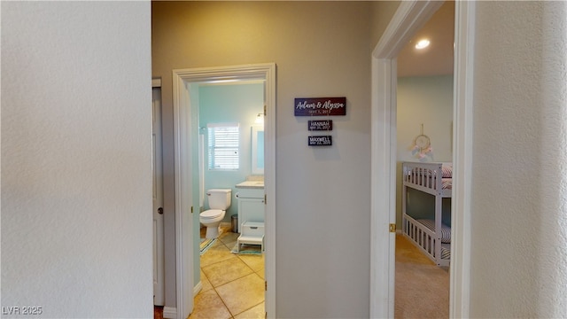 2713 Tanagrine Dr, North Las Vegas, NV 89084 - hall with light tile patterned floors