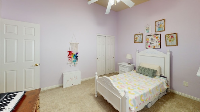 2713 Tanagrine Dr, North Las Vegas, NV 89084 - carpeted bedroom with a closet, baseboards, and a ceiling fan