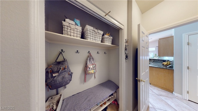 2713 Tanagrine Dr, North Las Vegas, NV 89084 - mudroom with light tile patterned floors