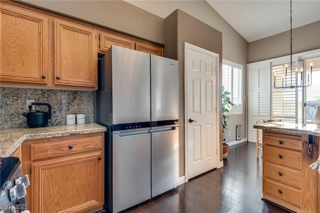 3088 Paseo Mountain Ave, Henderson, NV 89052 - kitchen with freestanding refrigerator, dark wood-type flooring, plenty of natural light, and backsplash