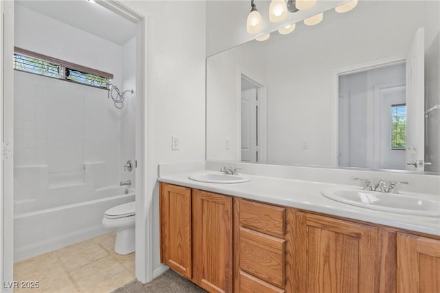 3273 Alcudia Bay Ave, Las Vegas, NV 89141 - bathroom featuring toilet, double vanity, healthy amount of natural light, and tub / shower combination
