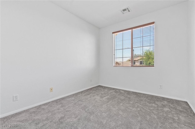 3273 Alcudia Bay Ave, Las Vegas, NV 89141 - empty room featuring carpet floors, baseboards, and lofted ceiling