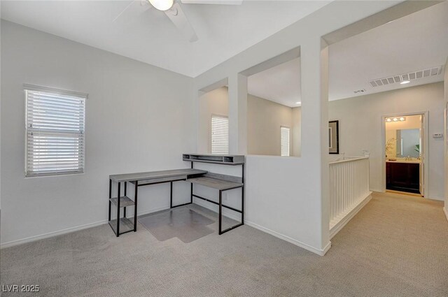5244 Fiery Sky Ridge St, Las Vegas, NV 89148 - empty room with carpet floors, a ceiling fan, and baseboards