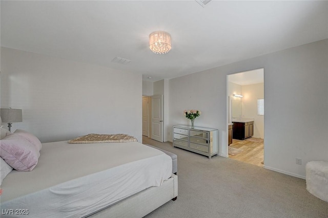 5244 Fiery Sky Ridge St, Las Vegas, NV 89148 - carpeted bedroom featuring baseboards and ensuite bathroom