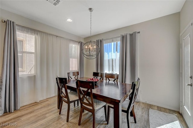 5244 Fiery Sky Ridge St, Las Vegas, NV 89148 - dining area featuring a chandelier, light wood-type flooring, and recessed lighting
