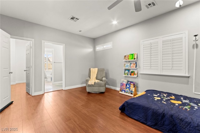 11274 Civita St, Las Vegas, NV 89141 - bedroom featuring wood finished floors, baseboards, connected bathroom, a ceiling fan, and recessed lighting