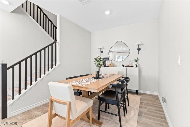 7350 N Decatur Blvd Unit 5, Las Vegas, NV 89131 - dining area featuring light wood-style floors, stairs, baseboards, and recessed lighting