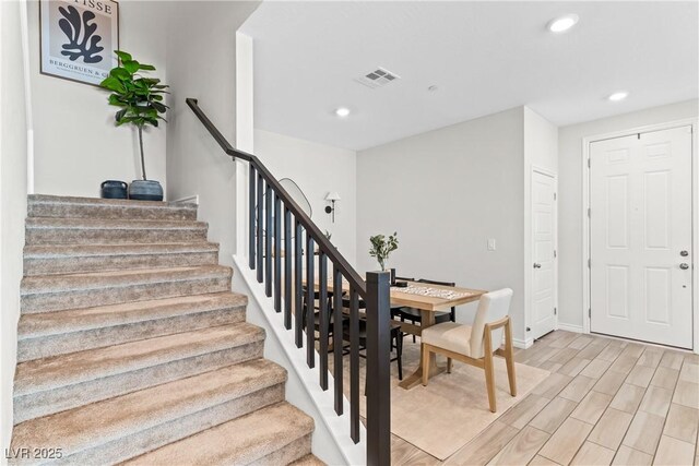 7350 N Decatur Blvd Unit 5, Las Vegas, NV 89131 - stairs featuring recessed lighting, wood finished floors, and baseboards