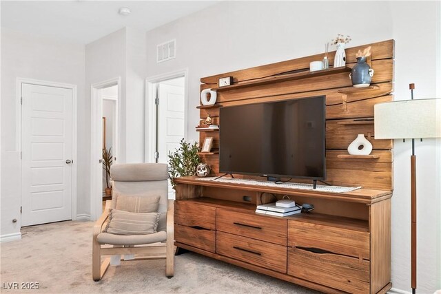 7350 N Decatur Blvd Unit 5, Las Vegas, NV 89131 - sitting room with light carpet and baseboards