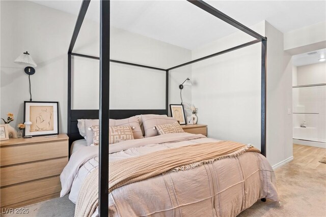 7350 N Decatur Blvd Unit 5, Las Vegas, NV 89131 - bedroom featuring light carpet and baseboards