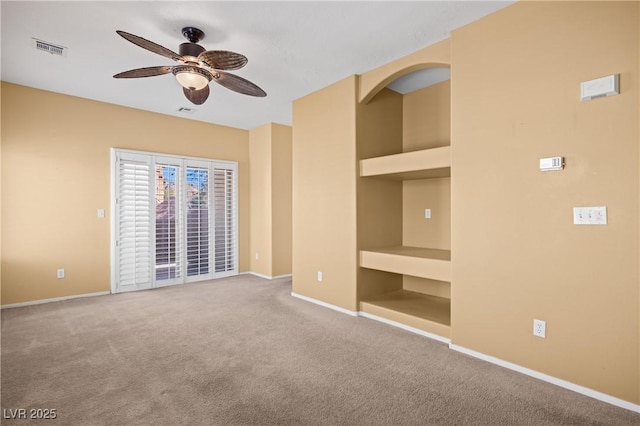 728 Hardy Way Unit E, Mesquite, NV 89027 - unfurnished bedroom featuring baseboards, carpet, a ceiling fan, and access to exterior