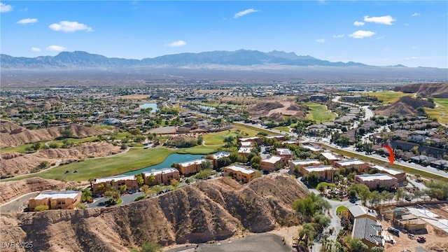 728 Hardy Way Unit E, Mesquite, NV 89027 - aerial perspective of suburban area with a water and mountain view and a golf club