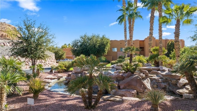 728 Hardy Way Unit E, Mesquite, NV 89027 - view of property's community with a small pond