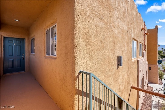 728 Hardy Way Unit E, Mesquite, NV 89027 - view of property exterior with stucco siding
