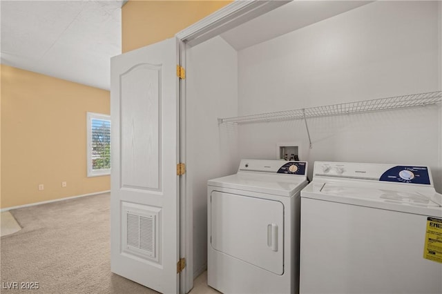728 Hardy Way Unit E, Mesquite, NV 89027 - washroom featuring washing machine and clothes dryer, light carpet, and baseboards