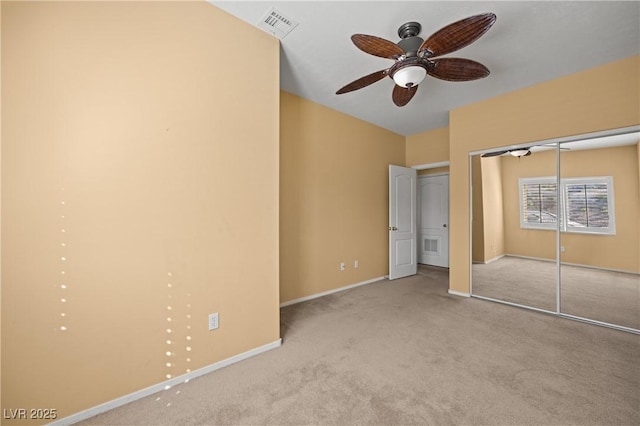 728 Hardy Way Unit E, Mesquite, NV 89027 - unfurnished bedroom featuring carpet floors, baseboards, a closet, and ceiling fan
